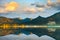 Lake wolfgangsee, austria On the mornings of autumn Mountains and trees reflect in the still water