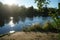 Lake Wuhlesee is surrounded by lush vegetation in September. Berlin, Germany