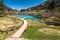 Lake Zelenci with observation trail footbridge in nature reserve Slovenia