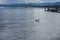 Lake zurich panorama view with big boat arriving on pier