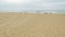 Lakes entrance beach in the summer in Australia, panning shot