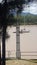 Lakes and Rivers - River in Rockhampton with water marker during flooding showing levels of flood waters Qld Australia