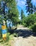 Lakeshore hiking trail with sign