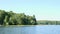 Lakeshore in northern Minnesota with boat docks, seen from a moving boat.