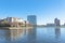 Lakeside apartment building complex with blue sky in America