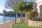 Lakeside apartment building complex with blue sky in America