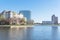 Lakeside apartment building complex with blue sky in America