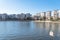 Lakeside apartment building complex with blue sky in America