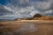 Lakeside beach and cliffs