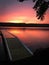 Lakeside dock at sunset