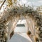 Lakeside elegance romantic wedding ceremony, white flowers, luxurious setup