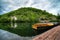 Lakeside landscape, cloudy sky, pre-storm silence