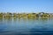 Lakeside modern dwelling buildings in sunny winter afternoon