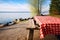 lakeside picnic table with a red checkered cloth