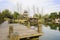 Lakeside planked dock in sunny winter afternoon