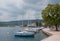 Lakeside promenade salo with sailboats