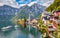 Lakeside village with charming houses and boats. landscape background, nature background