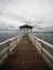 Lakeside waterfront esplanade pavilion gazebo elevated on wooden pier stilts in Lake Constance Bodensee Bregenz Austria