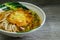 Laksa rice noodle with fried egg