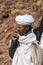 Lalibela, Ethiopia - Feb 13, 2020: Ethiopian people at the famous Rock-Hewn Church of Saint George - Bete Giyorgis