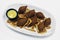 lamb kibbeh or kebbeh, popular middle eastern arabic snack in mezze platter