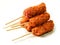 Lamb kofta kebab on skewer on a white background. Minced meat on a wooden stick for cooking on a barbeque. Summer season product.