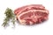 Lamb meat raw red with green herbs rosemary white isolated