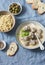 Lamb meatballs in a yogurt sauce and bulgur - yummy healthy lunch in a mediterranean style on a blue background