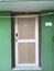 Laminated flush door with wooden frame for an room of an residential building or toilet area