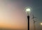 Lamp with 2 wind turbines in the twilight sky,with space leftside .