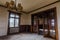 lamp and big wooden door in anteroom of house