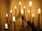 Lamp in the form of candles. Scandinavian symbol welcome. Festive Christmas or New Year`s cozy lighting of a house or apartment.