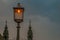 Lamp on the Hammersmith Bridge in the west side of London The first suspension bridge that crossed the River Thames from