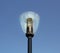 Lamp pole over the blue sky