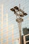 Lamp post in front of a Glass and concrete facade on a modern corporate skycraper building in Brazil