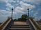 Lamp tower and steps Madavoor rock cut temple Park Thiruvananthapuram Kerala