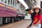Lampang, Thailand - August 4, 2019: child is waiting for the train at train station