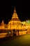 LAMPHUN, THAILAND - October 28, 2020 : Phra That Hariphunchai Pagoda with Lanna Style Lantern at Night