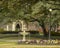 Lampost, flower bed, fountain and gazebo in Flippen Park in Highland Park in Dallas, Texas