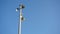 Lamppost against blue sky background