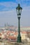 Lamppost on Charles Bridge, Prague castle view