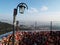 A lamppost next to a fence with love locks at Namsan park in Seoul