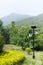 Lamppost powered by a solar panel in a mountain landscape in Chi