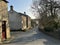Lancashire village, on a late winters day, with old stone cottages and trees in, Laneshaw Bridge, Lancashire, UK