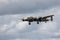 Lancaster bomber with prop blur with a cloudy background