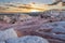 Land formations at White Pocket in the Vermillion Cliffs National Monument with a dramatic evening sky