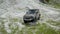 Land Rover Defender 2020 - Aerial drone view, Offroad test drive. Exterior view