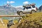 Land Rover offroading driving over tree trunks in the mountains..20/08/2010 - Val d`Isere, France