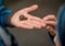 A land snail racing across a hand