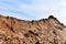 Land structure in open pit mining. Ground background in quarry. Rock texture during earthworks. Sand background and Earth crust